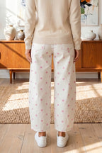 Pink polka dot print barrel jeans with seam details from Dear-Lover Dropshipping, made of cotton, polyester, and elastane.