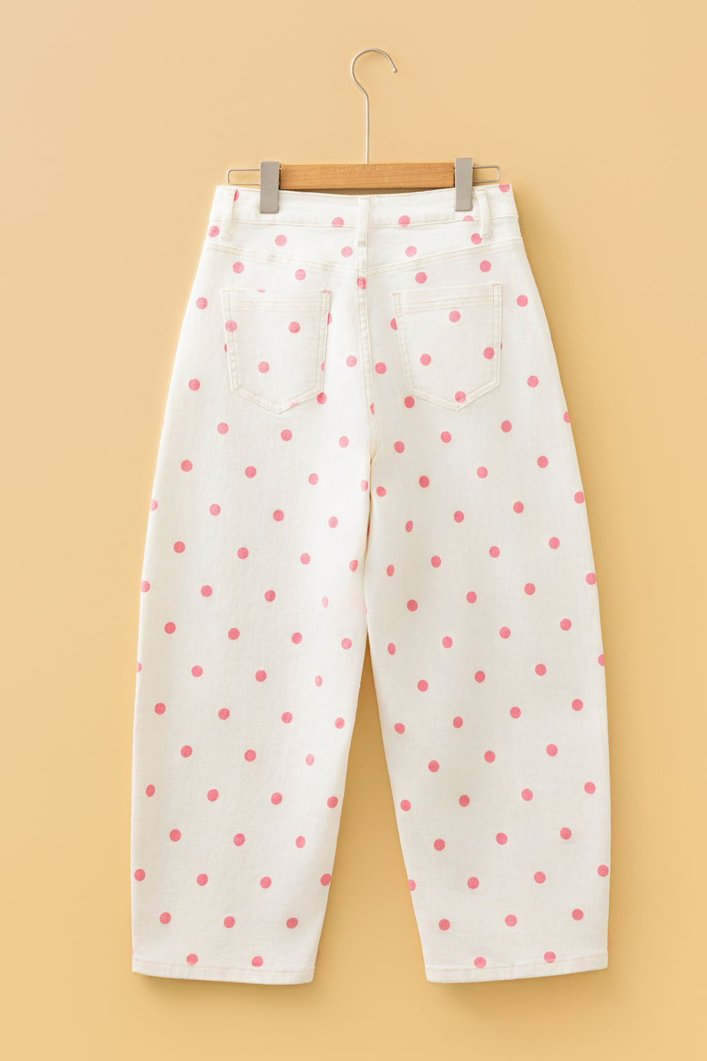 Pink polka dot print barrel jeans with seam details from Dear-Lover Dropshipping, made of cotton, polyester, and elastane.