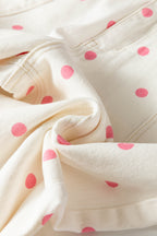Pink polka dot print barrel jeans with seam details from Dear-Lover Dropshipping, made of cotton, polyester, and elastane fabric.