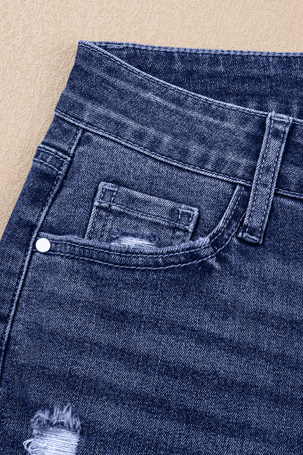 Dear-Lover distressed teal high-waist jeans with folded cuffs and straight-leg design, made from cotton, polyester, viscose, and elastane.