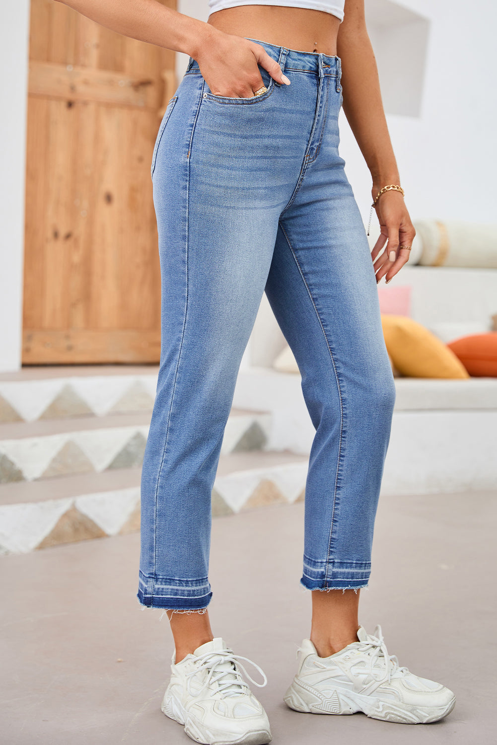 Sky blue whiskered wash raw hem cropped jeans by Dear-Lover Dropshipping, featuring a stylish distressed look and comfortable fit.