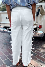 White Dear-Lover straight leg jeans with bow knot side detail and relaxed fit, made of cotton and elastane for comfort.