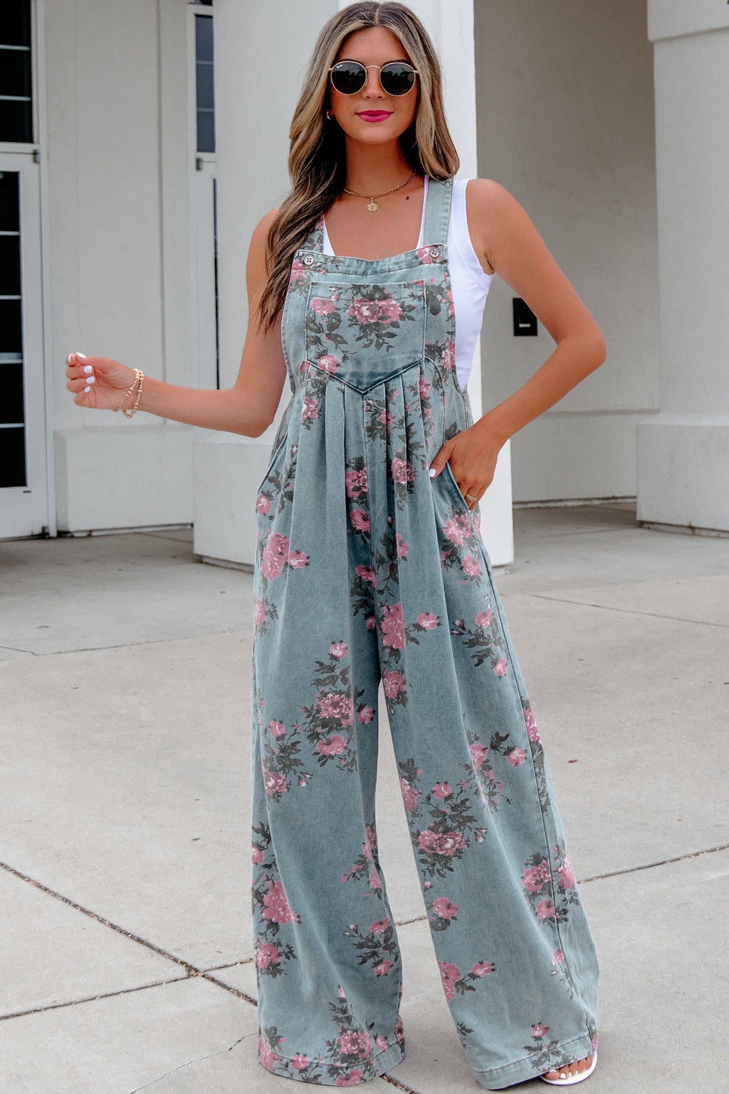 Beau blue floral print denim jumpsuit by Dear-Lover with high waist, pleated design, wide leg, and comfortable fabric.