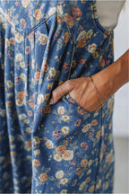 Blue vintage rose print pleated denim jumpsuit by Dear-Lover, loose fit, stylish overall romper with comfortable fabric blend.