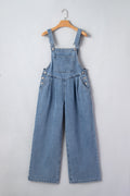 Dusk blue pleated wide-leg denim jumpsuit with retro pockets, featuring a relaxed fit and stylish design.