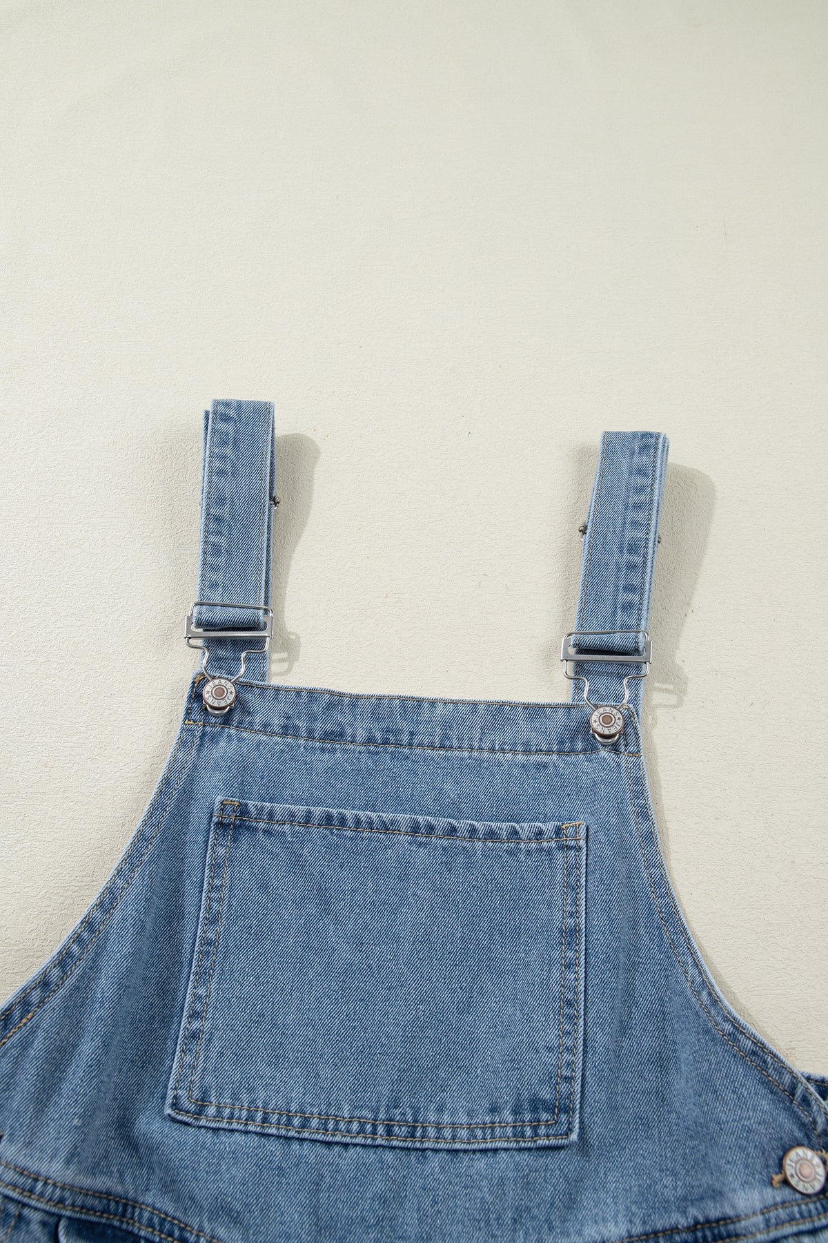 Dusk blue pleated wide-leg denim jumpsuit with retro pockets, designed by Dear-Lover Dropshipping, featuring a stylish casual look.