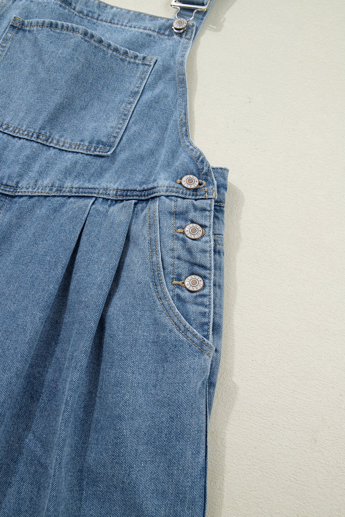 Dusk blue pleated wide-leg denim jumpsuit with retro pockets, made of cotton, polyester, and viscose, by Dear-Lover.