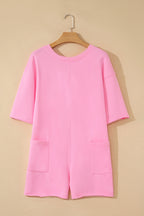 Pink solid color raw edge half sleeve romper with pockets, loose fit, made of cotton-polyester blend, by Dear-Lover.