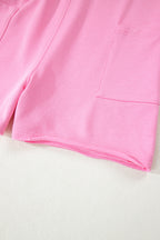 Pink solid color raw edge half sleeve romper with pockets, loose fit, made of cotton and polyester, from Dear-Lover Dropshipping.