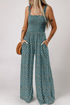 Purple floral print smocked high waist square neck jumpsuit by Dear-Lover, featuring a stylish design and comfortable fit.