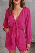 Rose tie knot V-neck puff long sleeve romper by Dear-Lover, featuring a stylish design and lightweight polyester fabric.