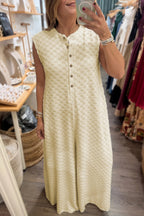 White sleeveless jumpsuit with half buttons, wide-leg textured design, from Dear-Lover, made of 100% polyester.
