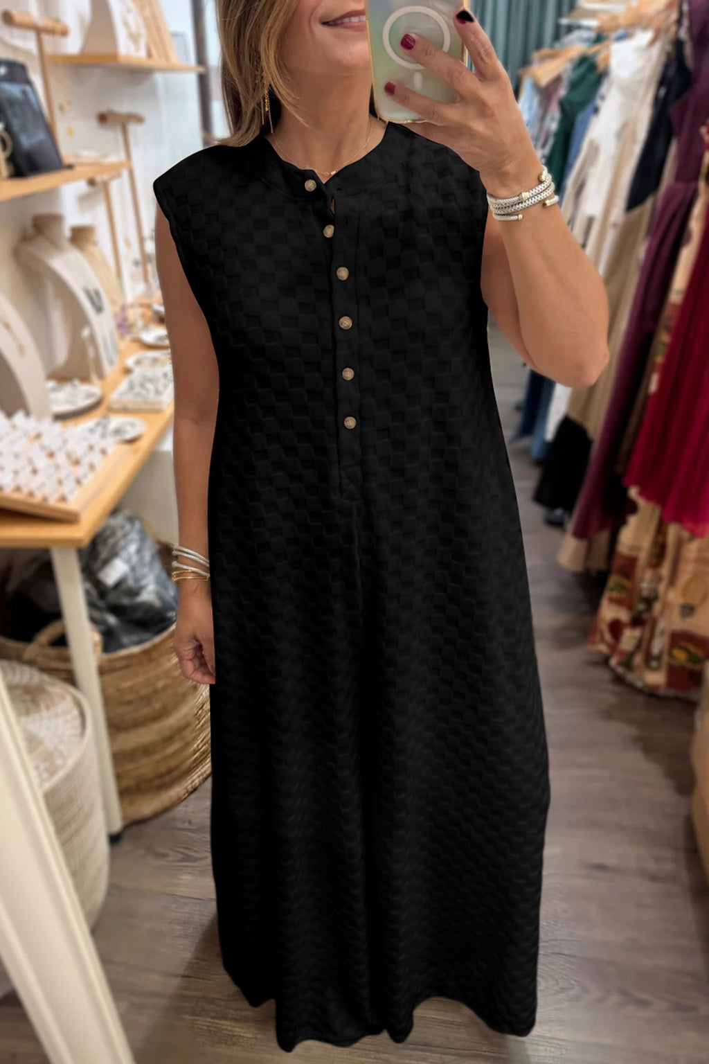 White sleeveless wide-leg textured jumpsuit with half buttons from Dear-Lover, made of lightweight polyester, perfect for stylish summer wear.