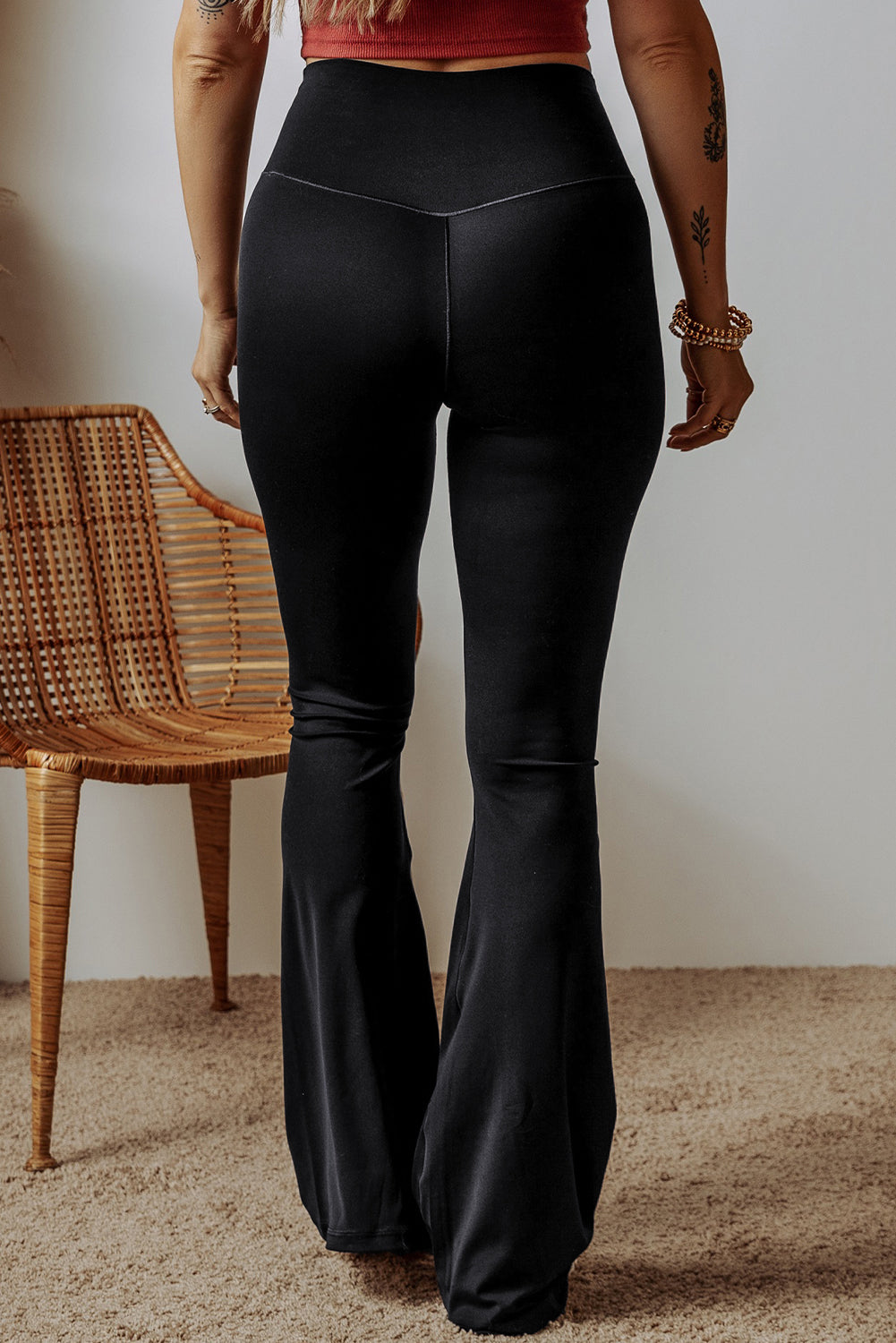 Black V-shape high waist flared leggings by Dear-Lover, made of polyamide and elastane, with a stylish flared leg design.