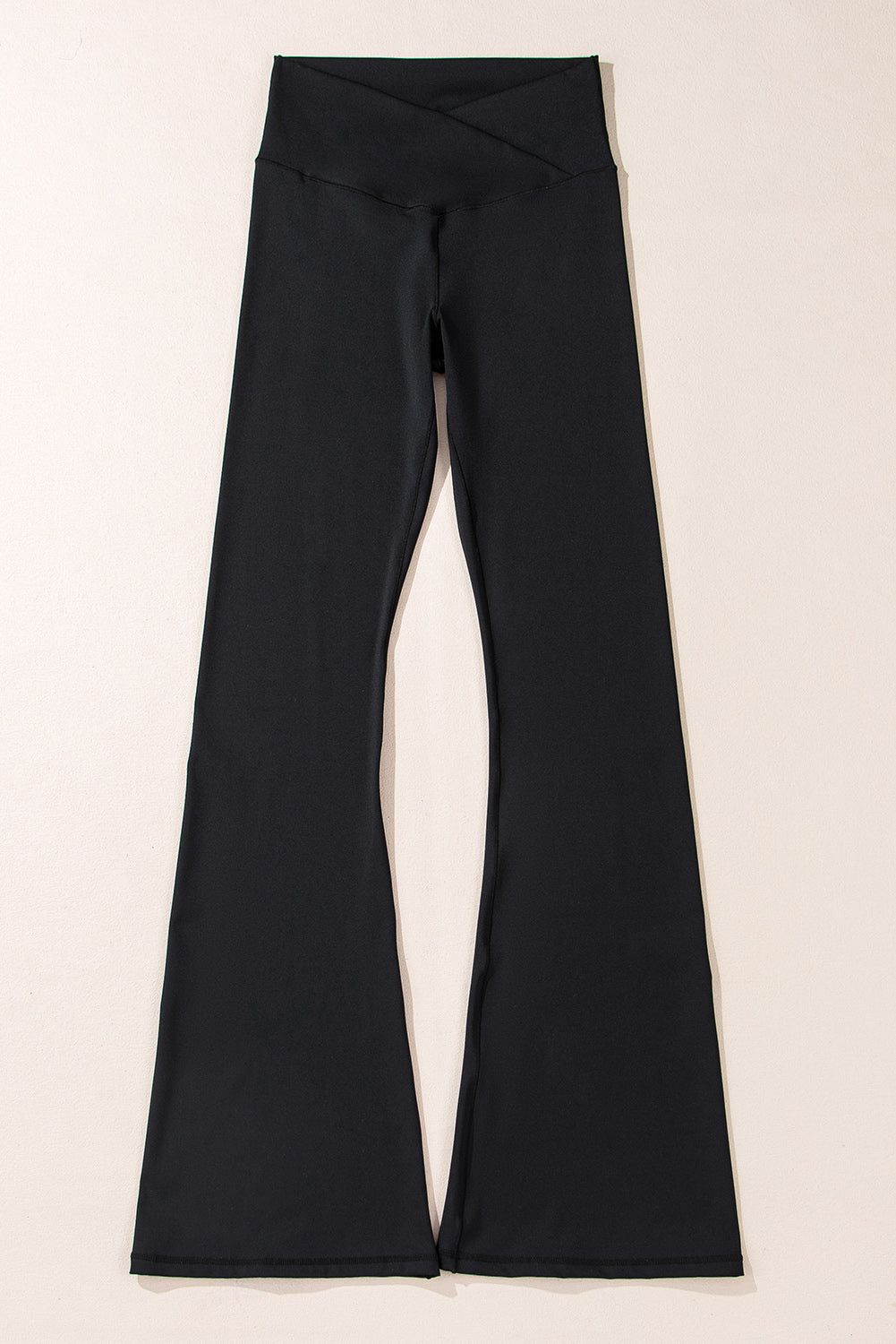 Black V-shape high waist flared leggings from Dear-Lover, made of polyamide and elastane, shown on a model.