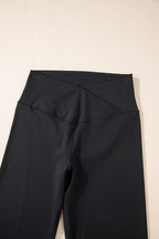 Black V shape high waist flared leggings by Dear-Lover, made of polyamide and elastane, featuring a stylish flared leg design.