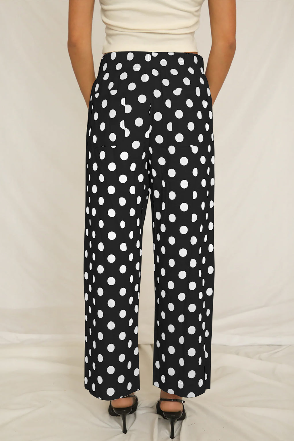 Black polka dot print patched pocket mid-rise straight leg pants by Dear-Lover Dropshipping, made of polyester, with a casual fit.