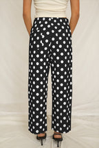 Black polka dot print patched pocket mid-rise straight leg pants by Dear-Lover Dropshipping, made of polyester, with a casual fit.