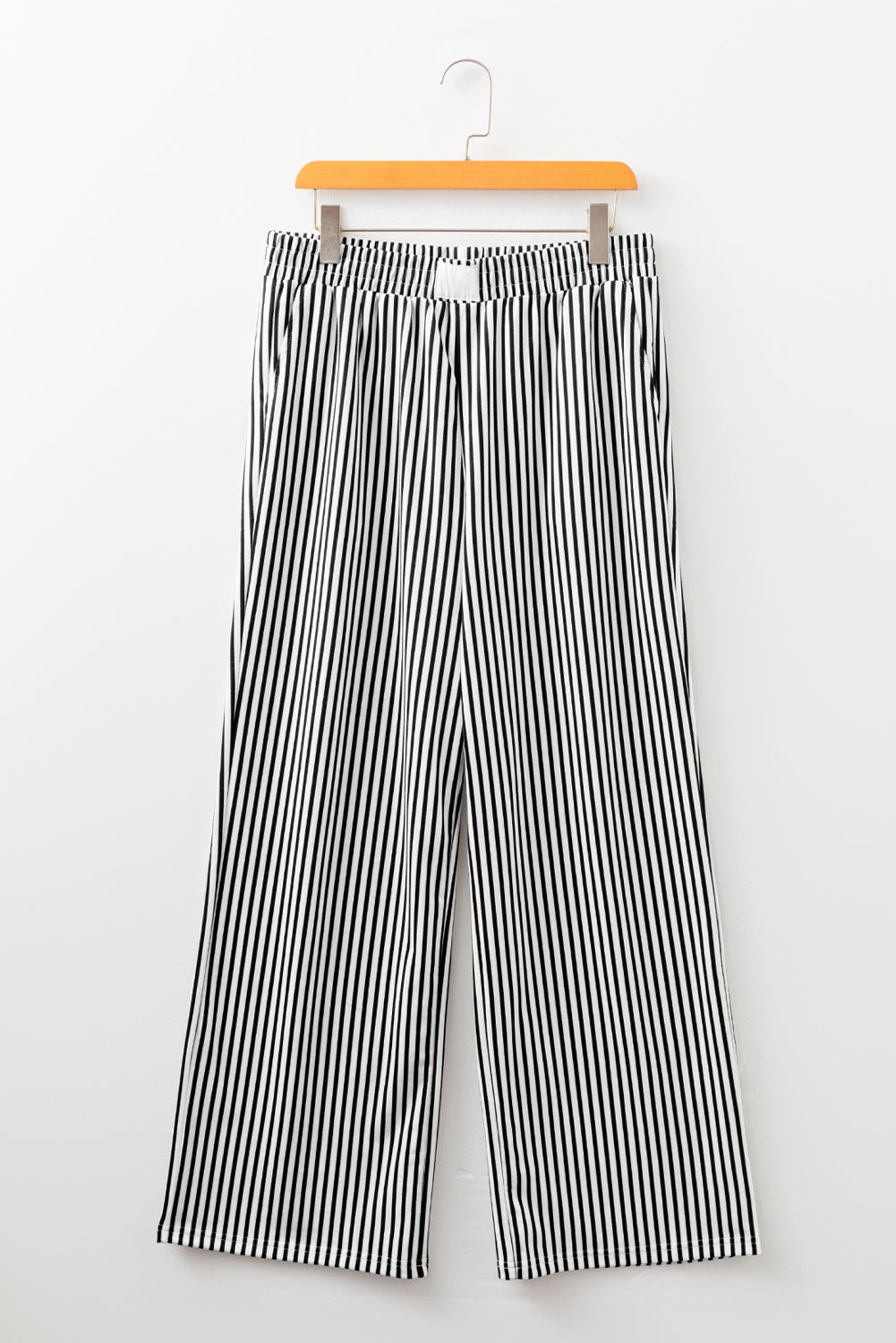 Black stripe elastic high waist culotte pants with pockets, made of polyester and elastane, featuring a loose fit and stylish design.