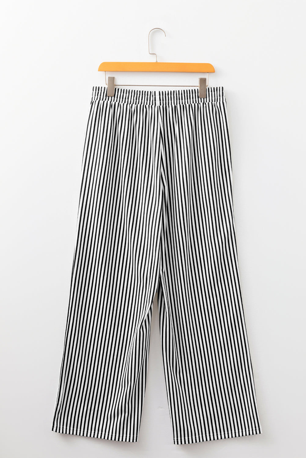Black stripe elastic high waist culotte pants with pockets, made of polyester and elastane, designed for a relaxed fit.