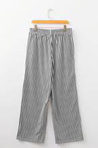 Black stripe elastic high waist culotte pants with pockets, made of polyester and elastane, designed for a relaxed fit.