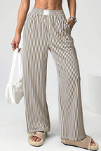 Black stripe elastic high waist pocketed loose pants from Dear-Lover, featuring a relaxed fit, polyester blend, and stylish culotte design.
