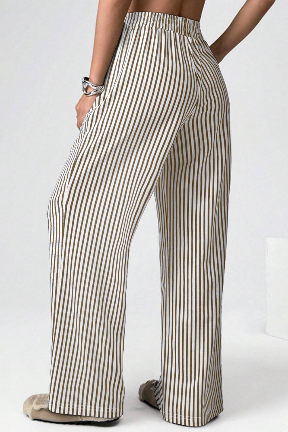 Black stripe elastic high waist culotte pants with pockets, made of polyester and elastane, designed for a loose fit and comfort.
