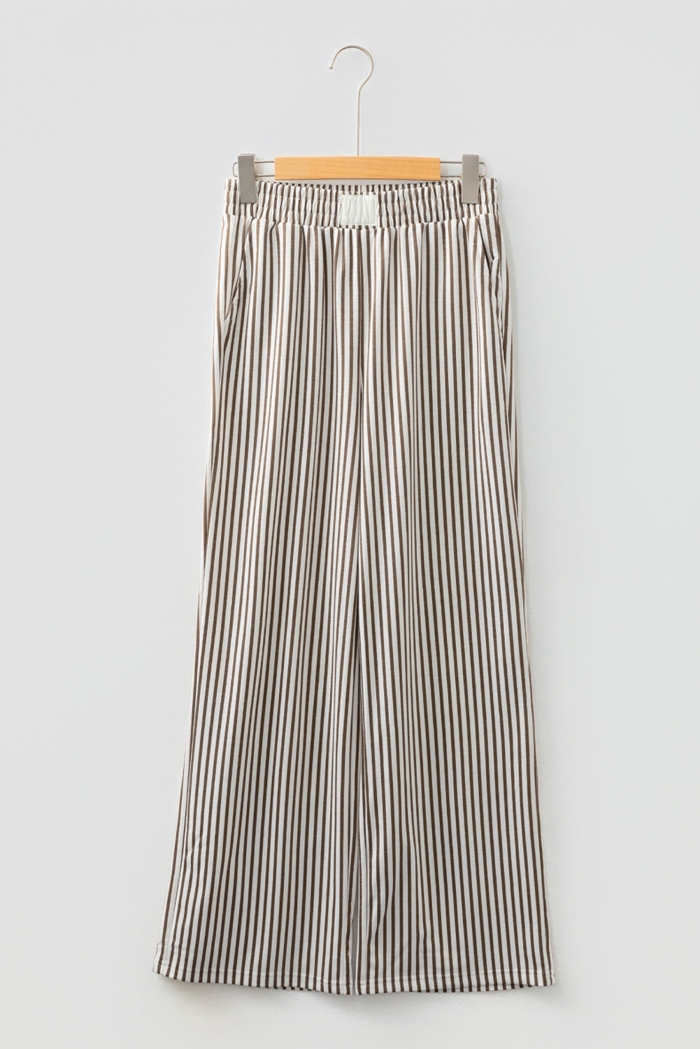Black stripe elastic high waist pants with pockets, loose fit, made of polyester and elastane, stylish casual bottoms by Dear-Lover.