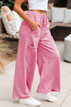 Dear-Lover mineral wash wide-leg cargo pants with exposed seams, drawstring elastic waistband, made of 100% cotton, casual bottoms.