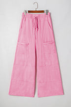 Dear-Lover mineral wash cargo pants with wide-leg design, exposed seams, drawstring waist, made from 100% cotton.