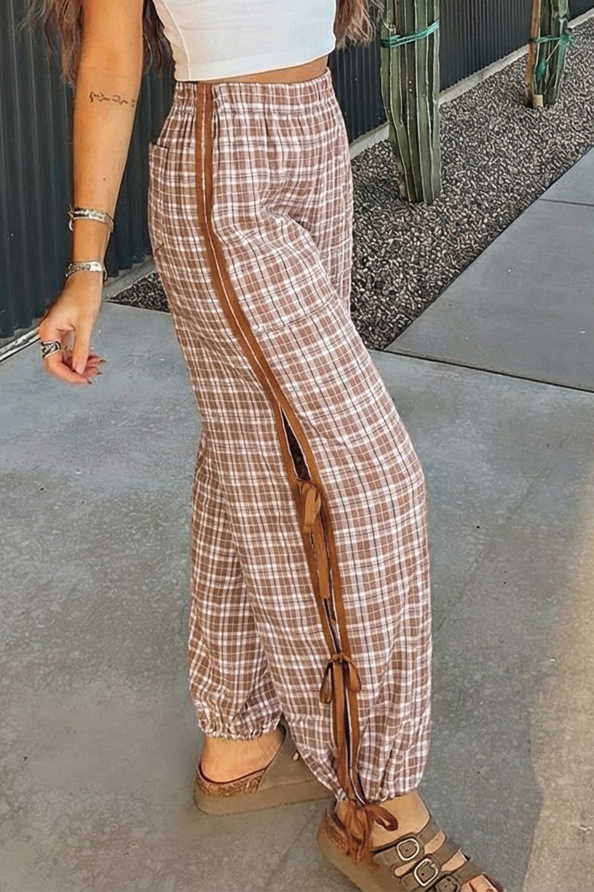 Chestnut plaid print jogger pants with elastic waist, bow tie detail, and contrasting accents, from Dear-Lover Dropshipping.