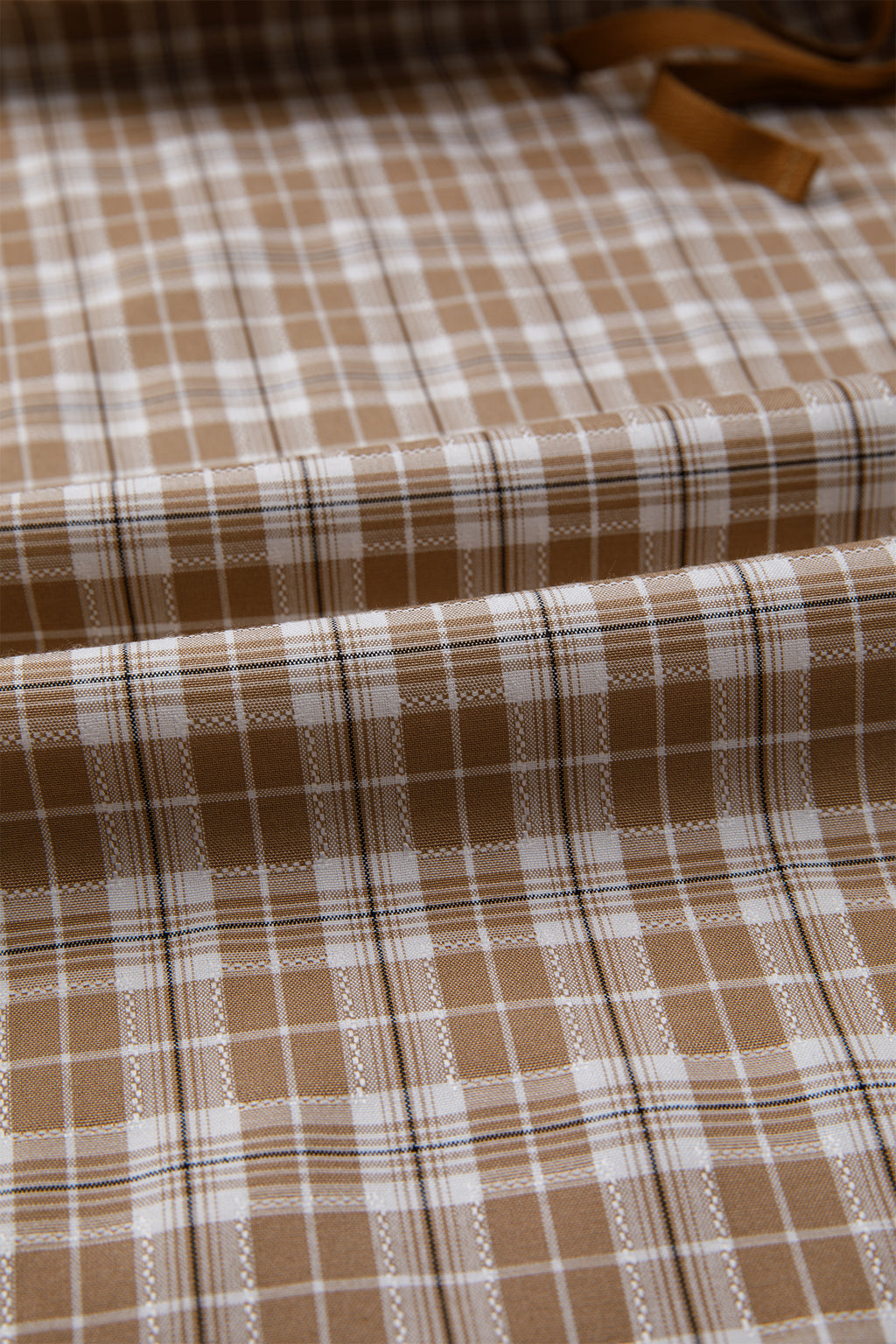 Chestnut plaid print jogger pants with elastic waist, bow tie detail, and contrast accents from Dear-Lover, made of polyester, viscose, and elastane.
