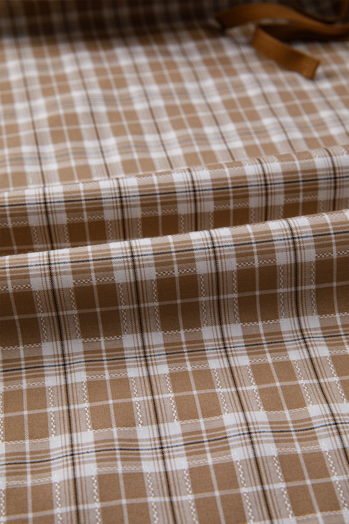 Chestnut plaid print jogger pants with elastic waist, bow tie detail, and contrast accents from Dear-Lover, made of polyester, viscose, and elastane.