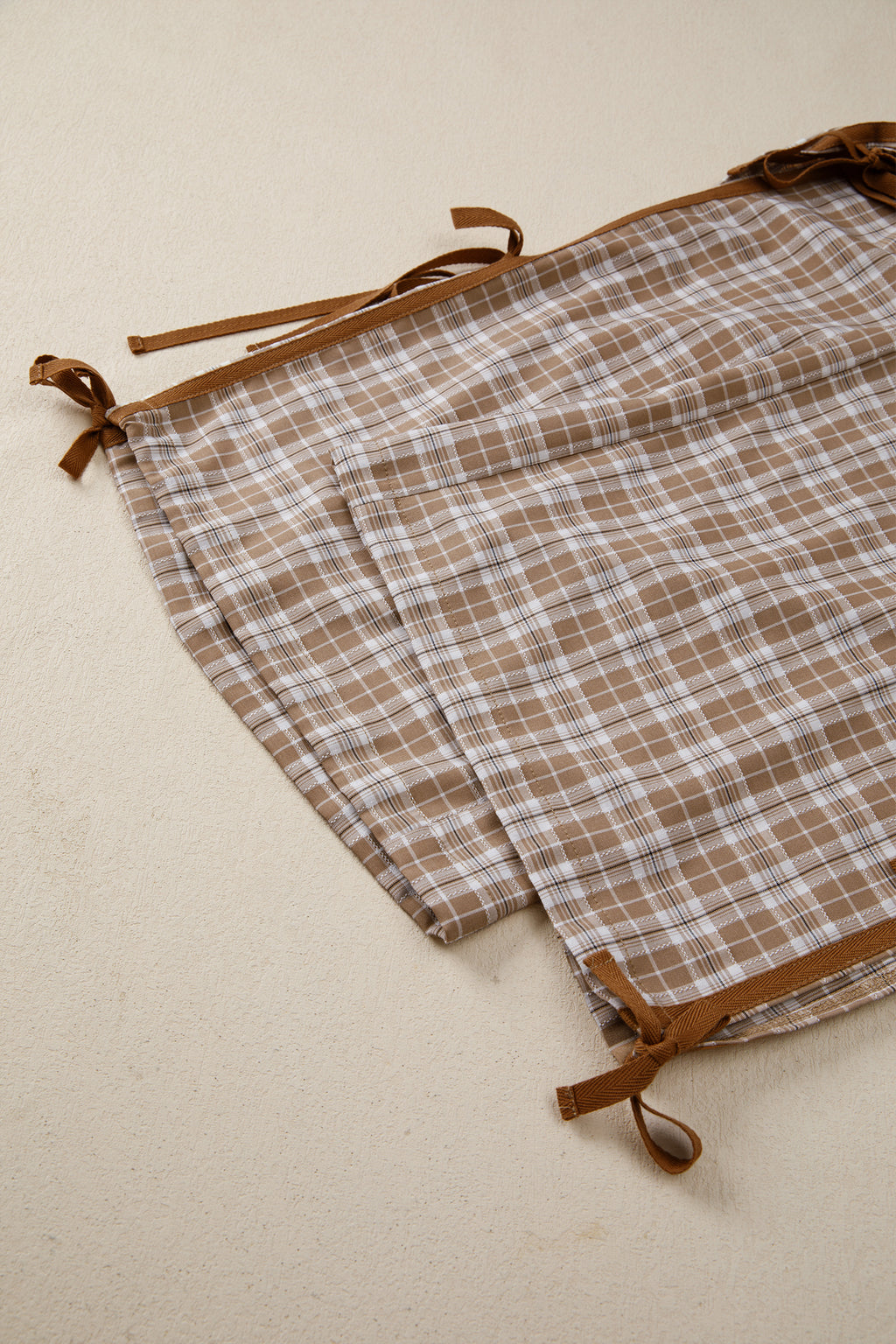 Chestnut plaid print jogger pants with elastic waist, bow tie, and contrast details by Dear-Lover, made of polyester, viscose, and elastane.