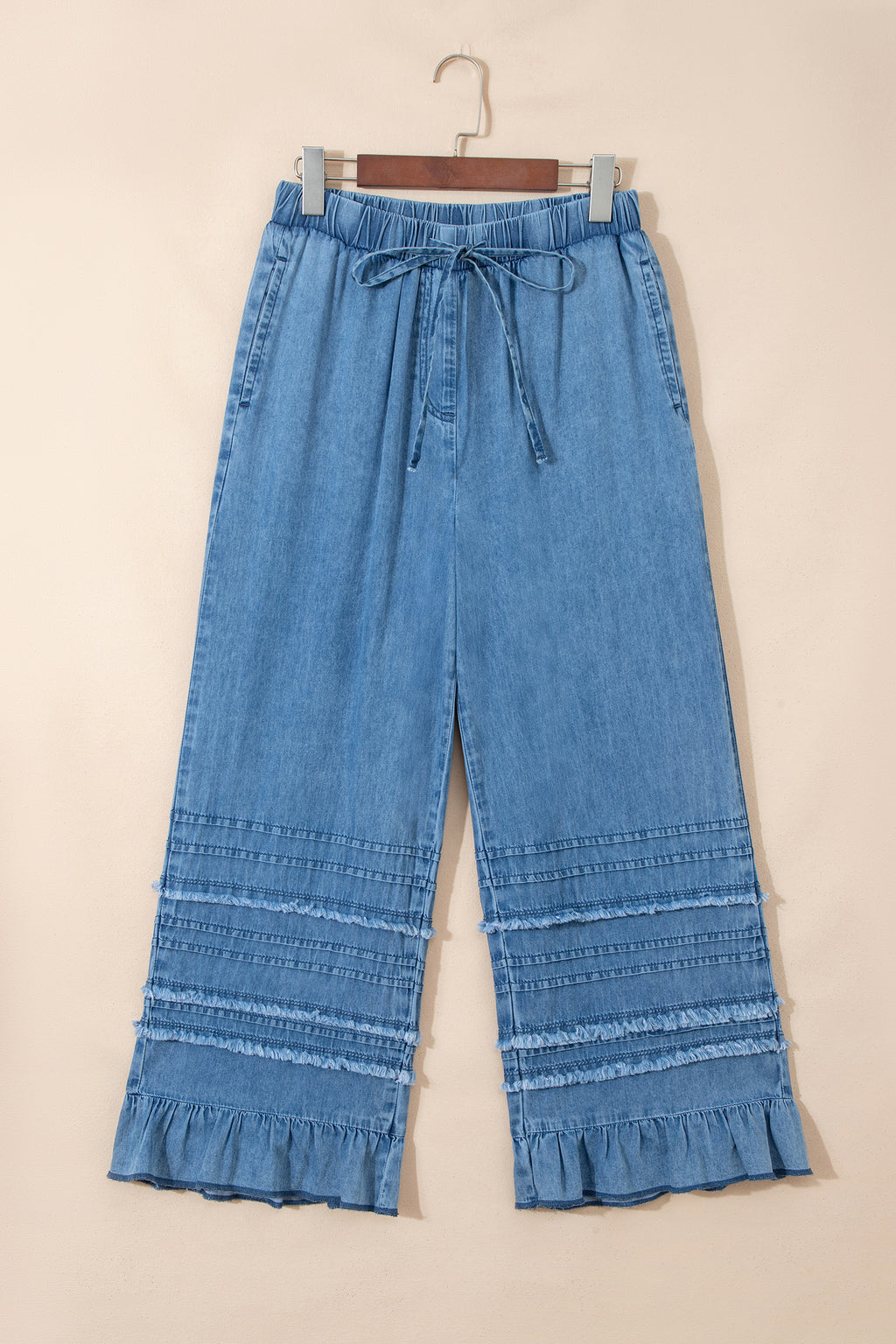 Dusk blue ruffled hem wide-leg chambray pants by Dear-Lover, featuring a relaxed fit and stylish ruffle detail at the hem.