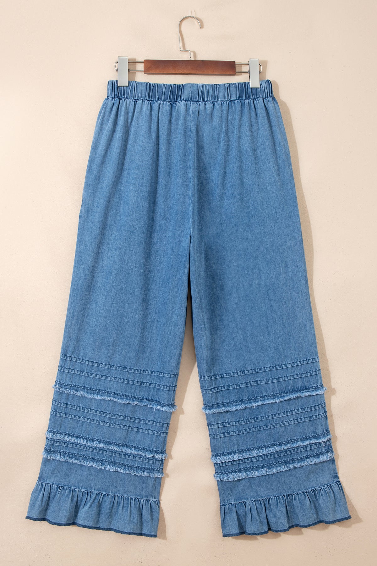 Dusk blue ruffled hem wide-leg chambray pants by Dear-Lover, featuring a relaxed fit and stylish ruffle details at the hem.