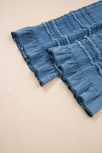 Dusk blue ruffled hem wide-leg chambray pants by Dear-Lover, featuring flowy culotte style and 100% cotton fabric.