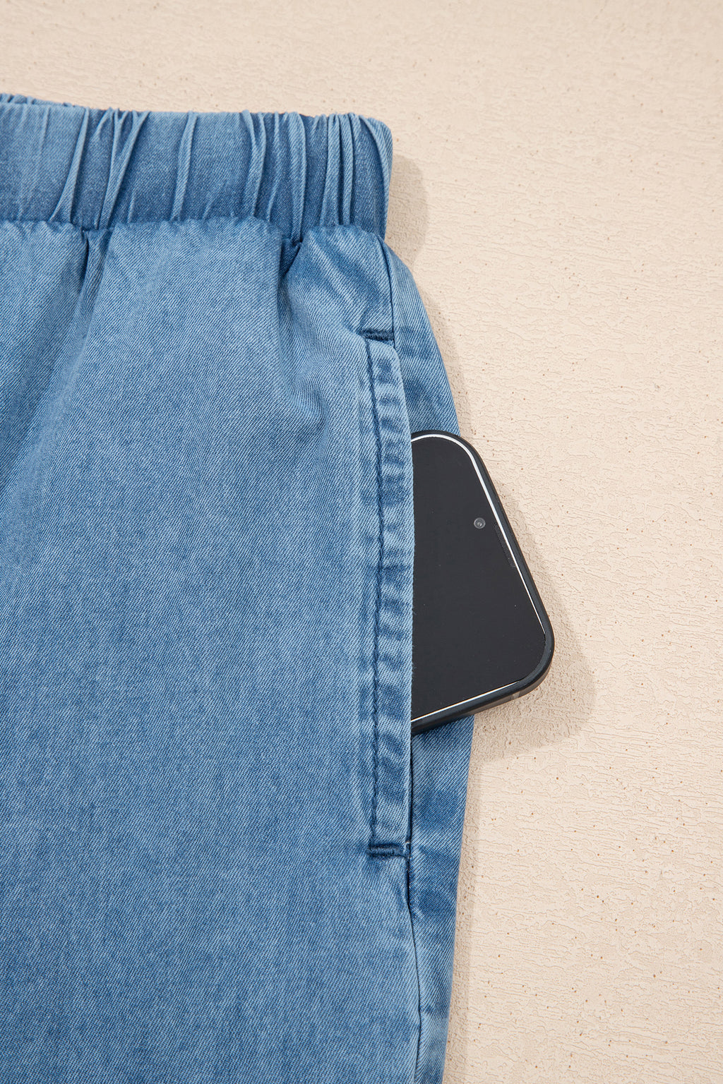Dusk blue ruffled hem wide-leg chambray pants by Dear-Lover, featuring relaxed fit, cotton fabric, and stylish culotte design.