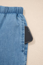 Dusk blue ruffled hem wide-leg chambray pants by Dear-Lover, featuring relaxed fit, cotton fabric, and stylish culotte design.