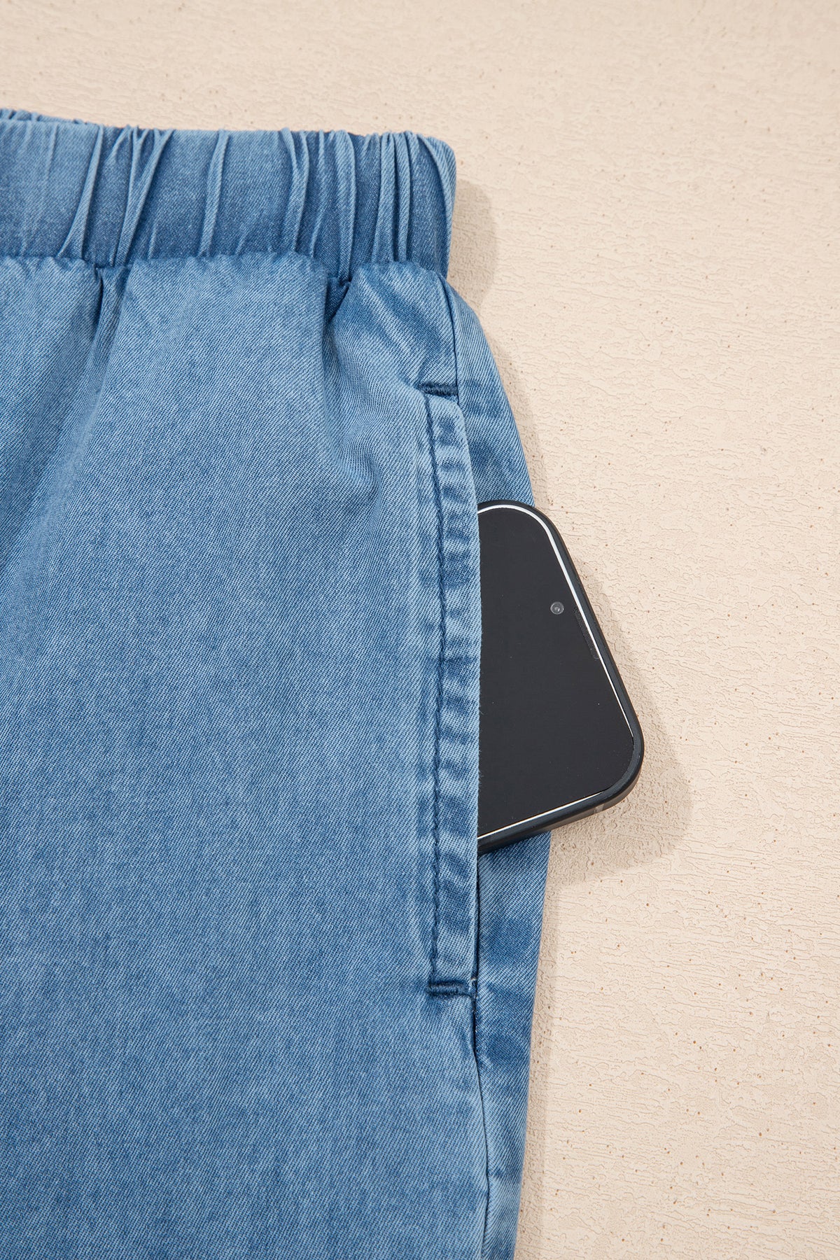 Dusk blue ruffled hem wide-leg chambray pants by Dear-Lover, featuring relaxed fit, cotton fabric, and stylish culotte design.
