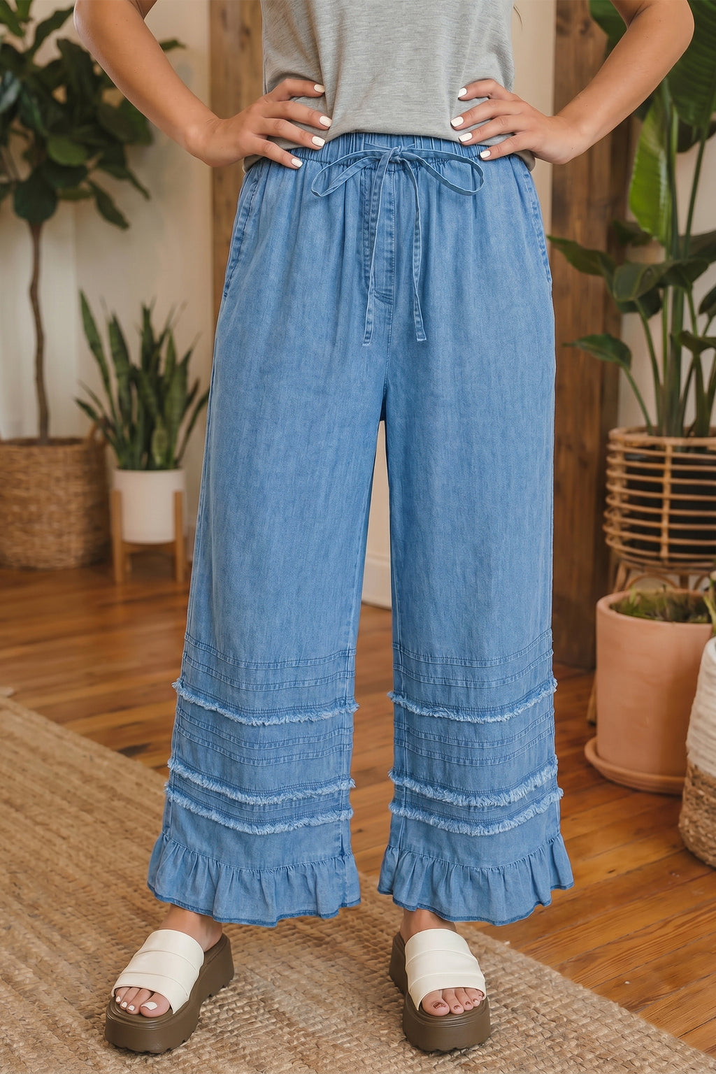 Dusk blue ruffled hem wide-leg chambray pants by Dear-Lover, featuring a relaxed fit and 100% cotton fabric.