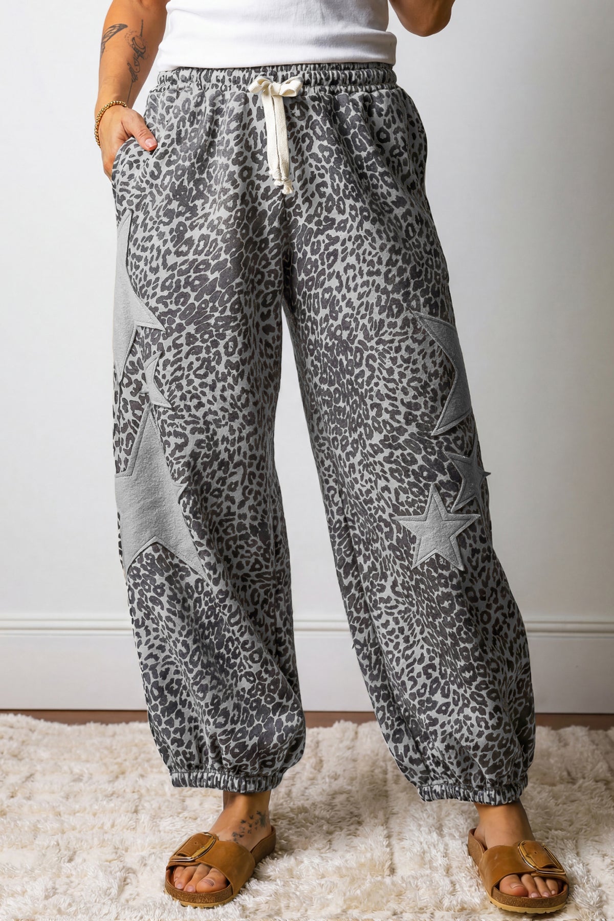 Gray leopard print jogger pants with star patches, drawstring waist, elastic band, casual bottoms from Dear-Lover.