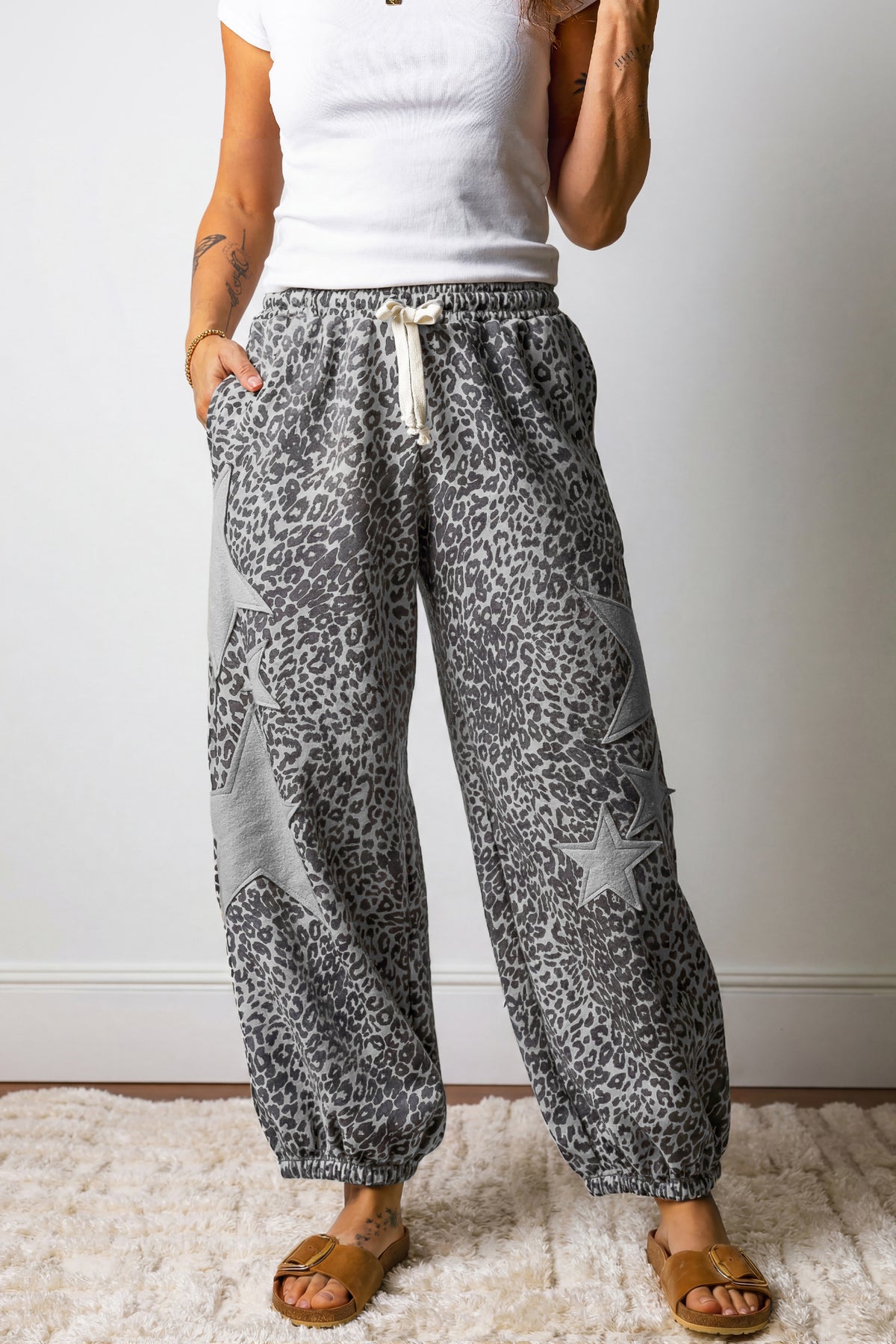 Gray leopard print jogger pants with star patches, drawstring waist, elastic band, from Dear-Lover Dropshipping, casual bottom wear.