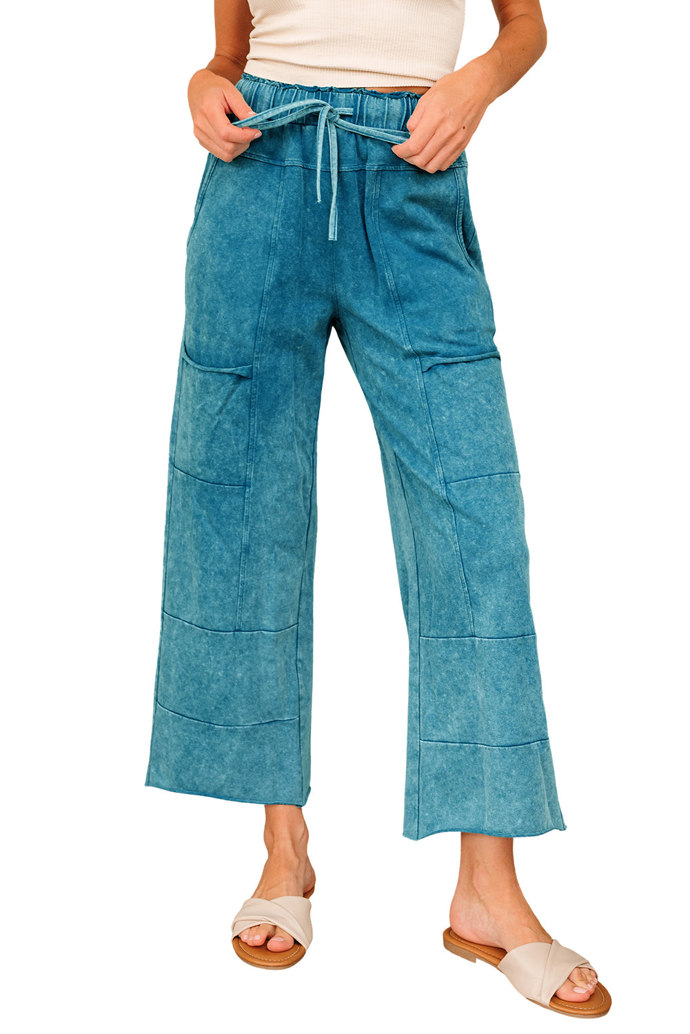 Medium grey lace-up high waist pants with raw hem, patched pockets, and lapis mineral wash by Dear-Lover Dropshipping.