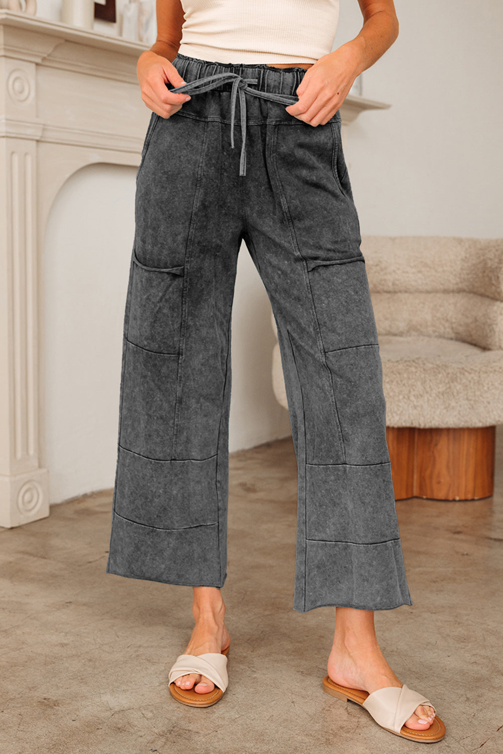 Medium grey lace-up high waist pants with raw hem, patched pockets, and lapis mineral wash from Dear-Lover.