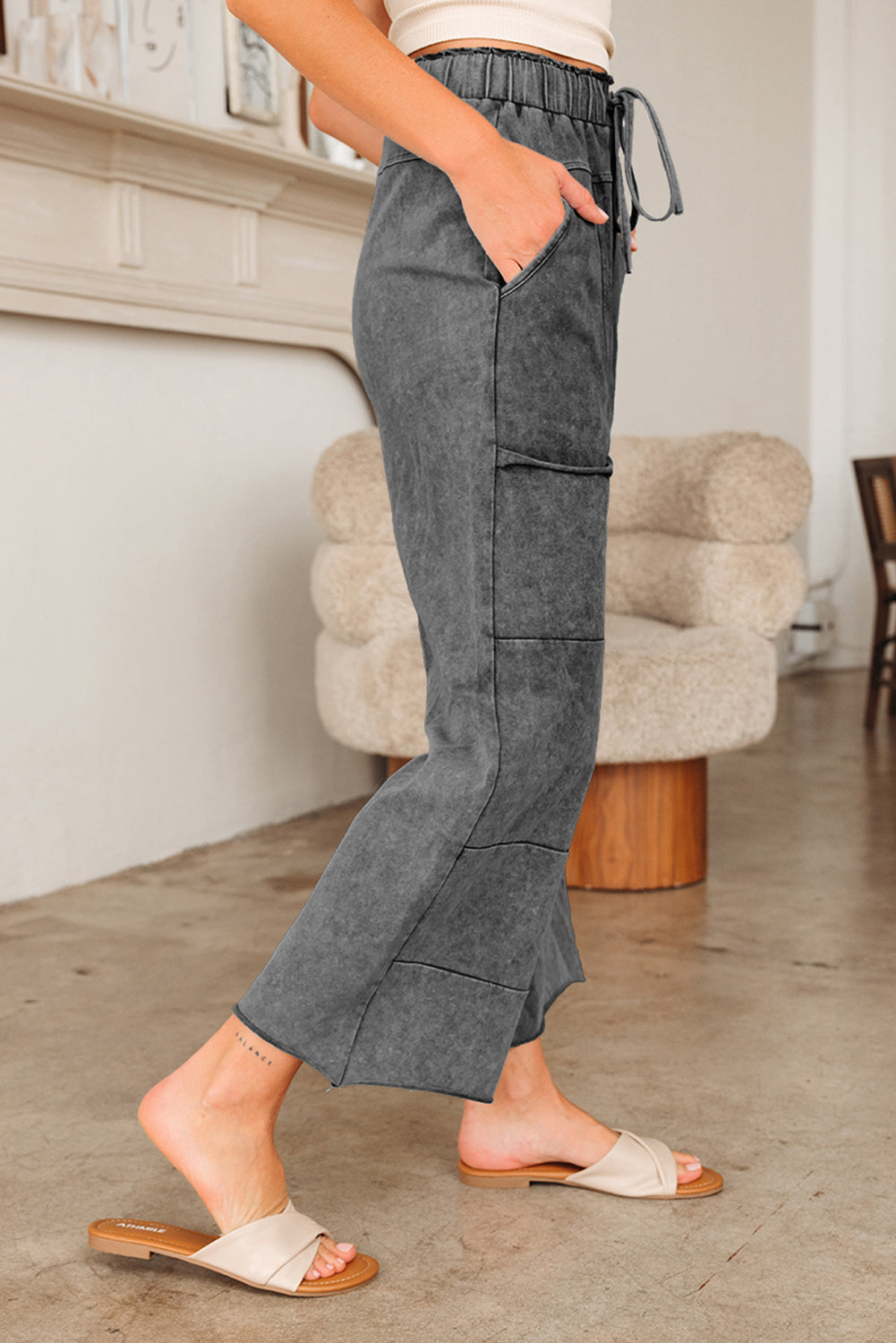 Medium grey Lapis Mineral Wash lace-up high waist pants with raw hem, patched pockets, and culotte style from Dear-Lover.