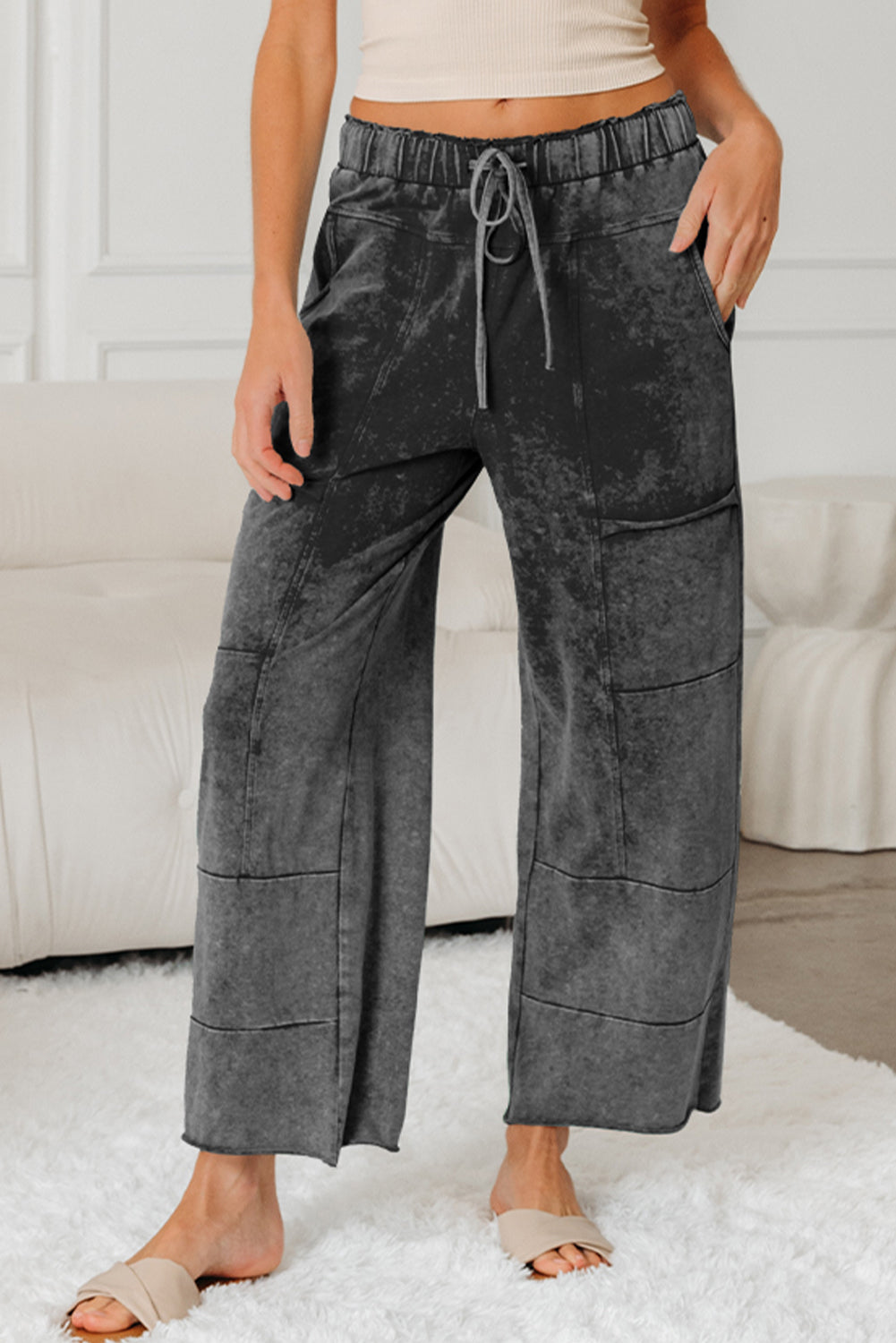 Medium grey Lapis Mineral Wash lace-up high waist pants with raw hem, patched pockets, and a culotte style from Dear-Lover Dropshipping.