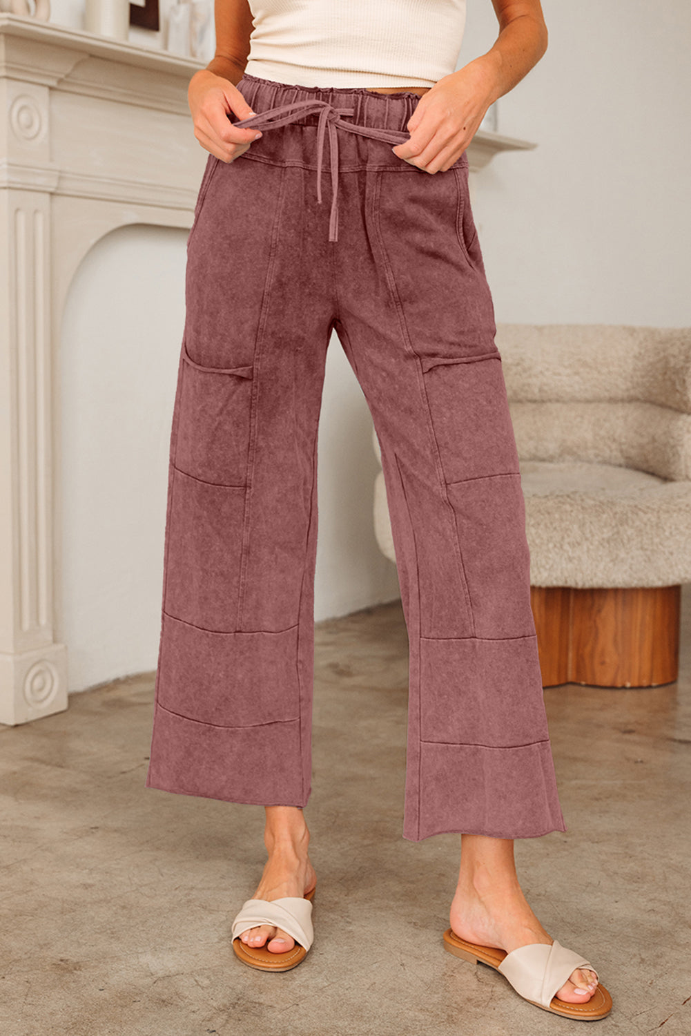 Medium grey Lapis Mineral Wash lace-up high waist pants with raw hem, patched pockets, and culotte style from Dear-Lover.