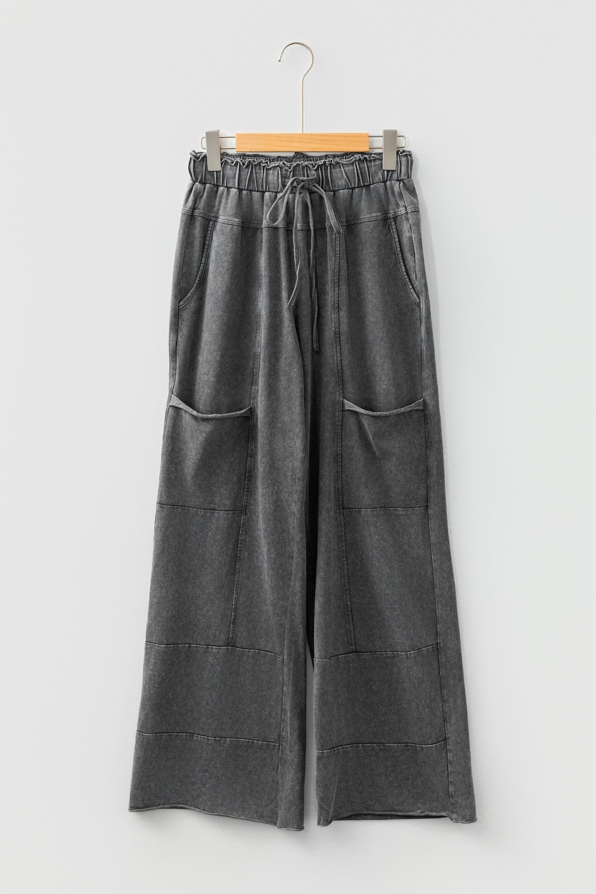 Medium grey high waist lace-up pants with raw hem, patched pockets, and lapis mineral wash, from Dear-Lover.
