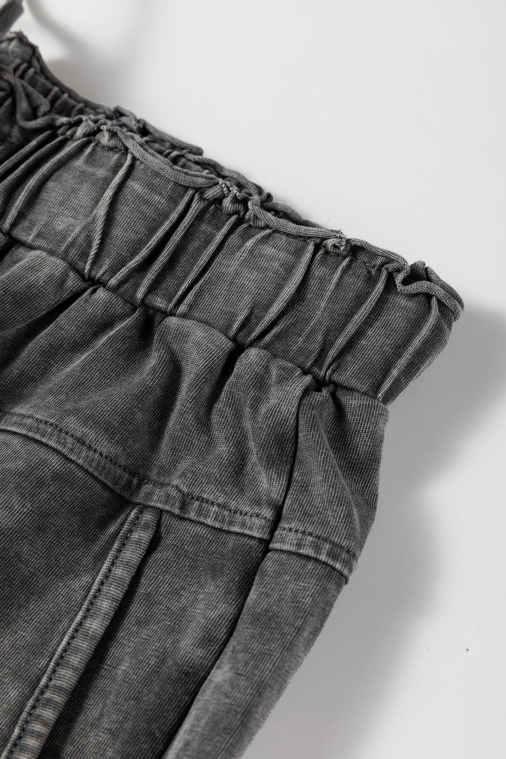 Medium grey high waist lace-up pants with raw hem, patch pockets, and mineral wash, designed by Dear-Lover for a casual look.
